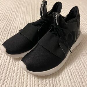 adidas Women's Black and White Slip-On Sneakers